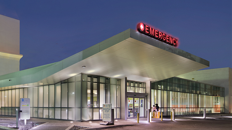 the entrance to the ER building at night time.