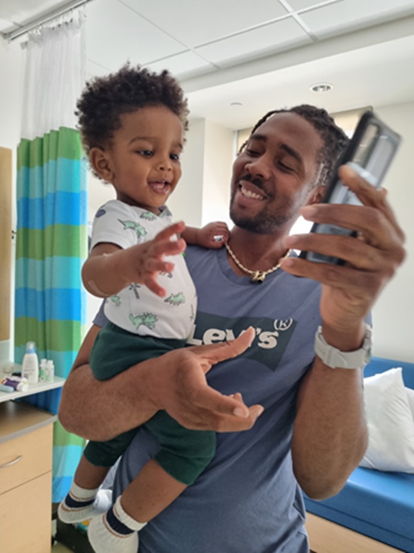 Wyatt smiling with his dad
