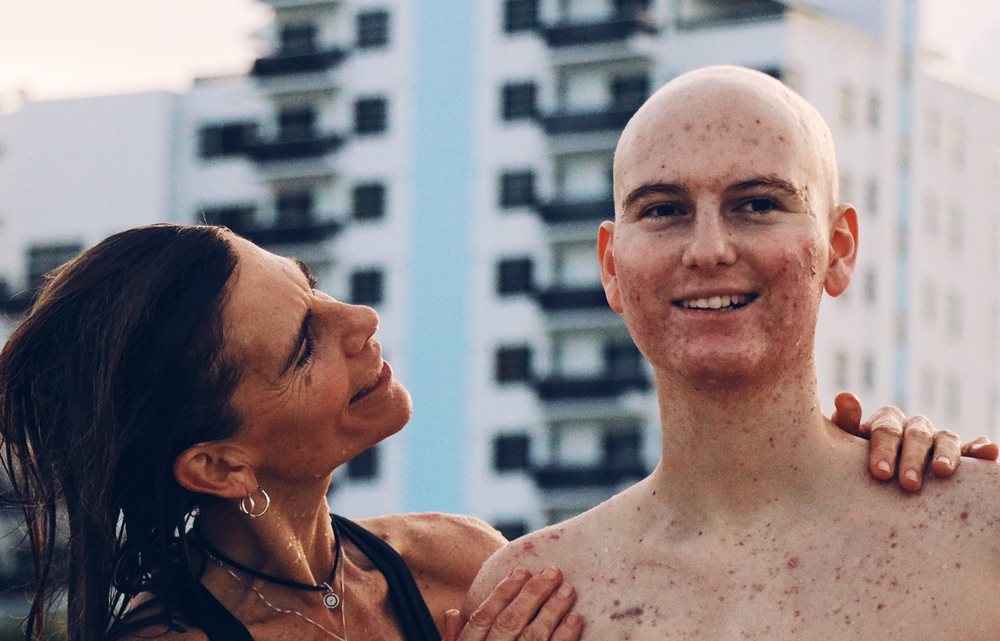 Michael at the beach with his mother.