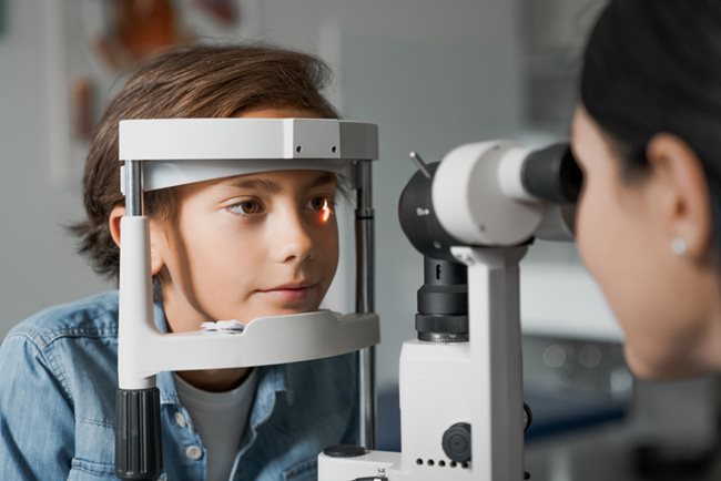 A young child undergoing an eye exam 