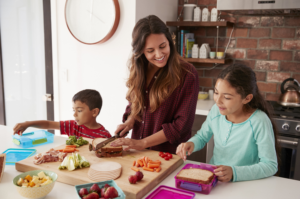 Mom making lunch with her kids