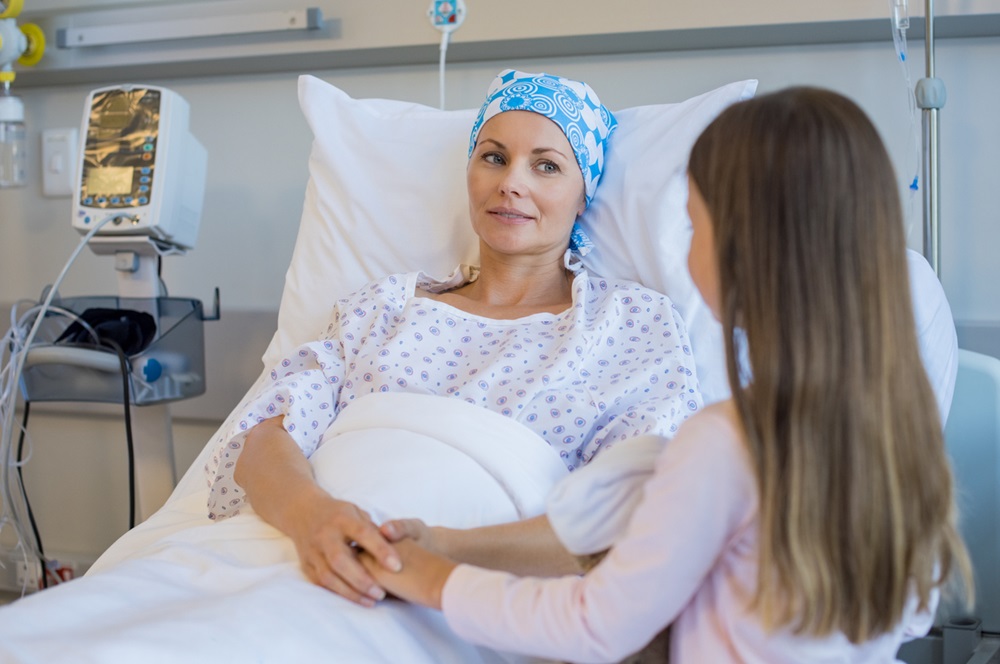 Daughter talking to mom who has cancer