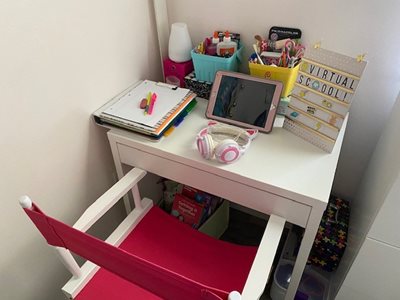 An empty seated young girl’s desk 