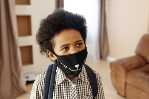 Boy wearing a mask