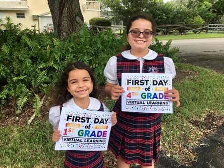 Two young children on their first day of school  