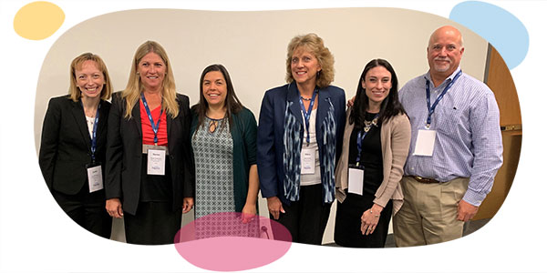 group of nurses attending conference wearing conference badges.