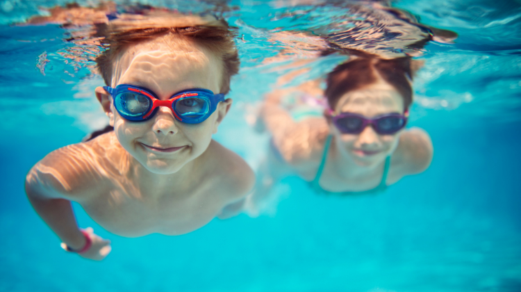 children swimming underwater