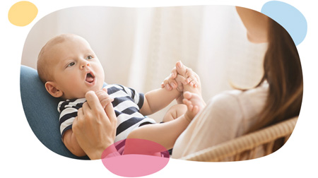 baby cooing while looking at mom