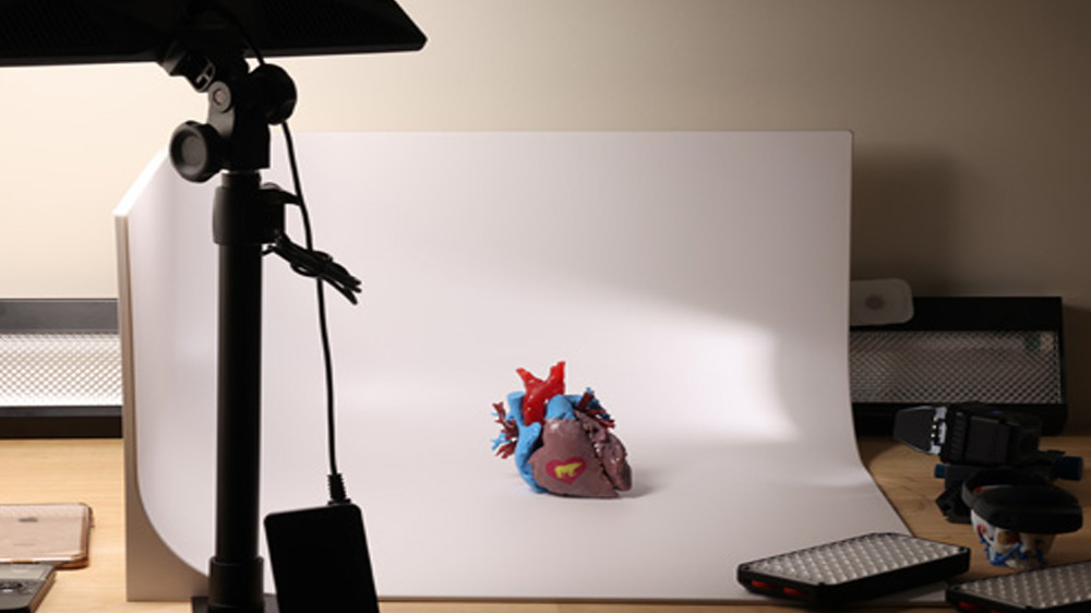 3d printed heart in a photography studio