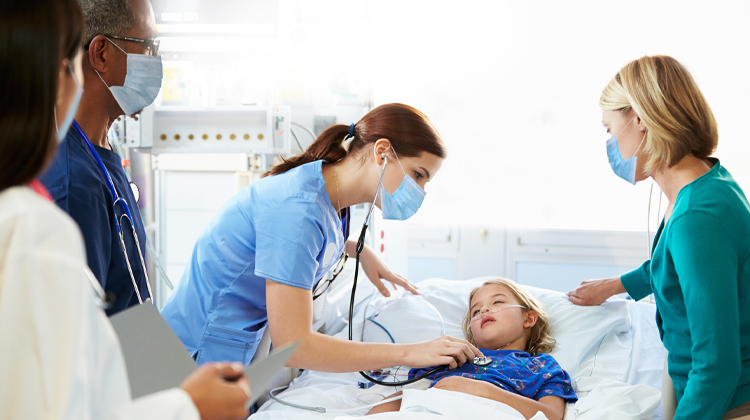 Girl receiving care and support from medical team.
