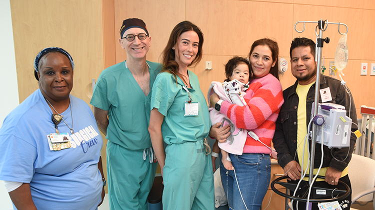 Surgical team with patient family before the first surgery in Griffin Surgical Tower