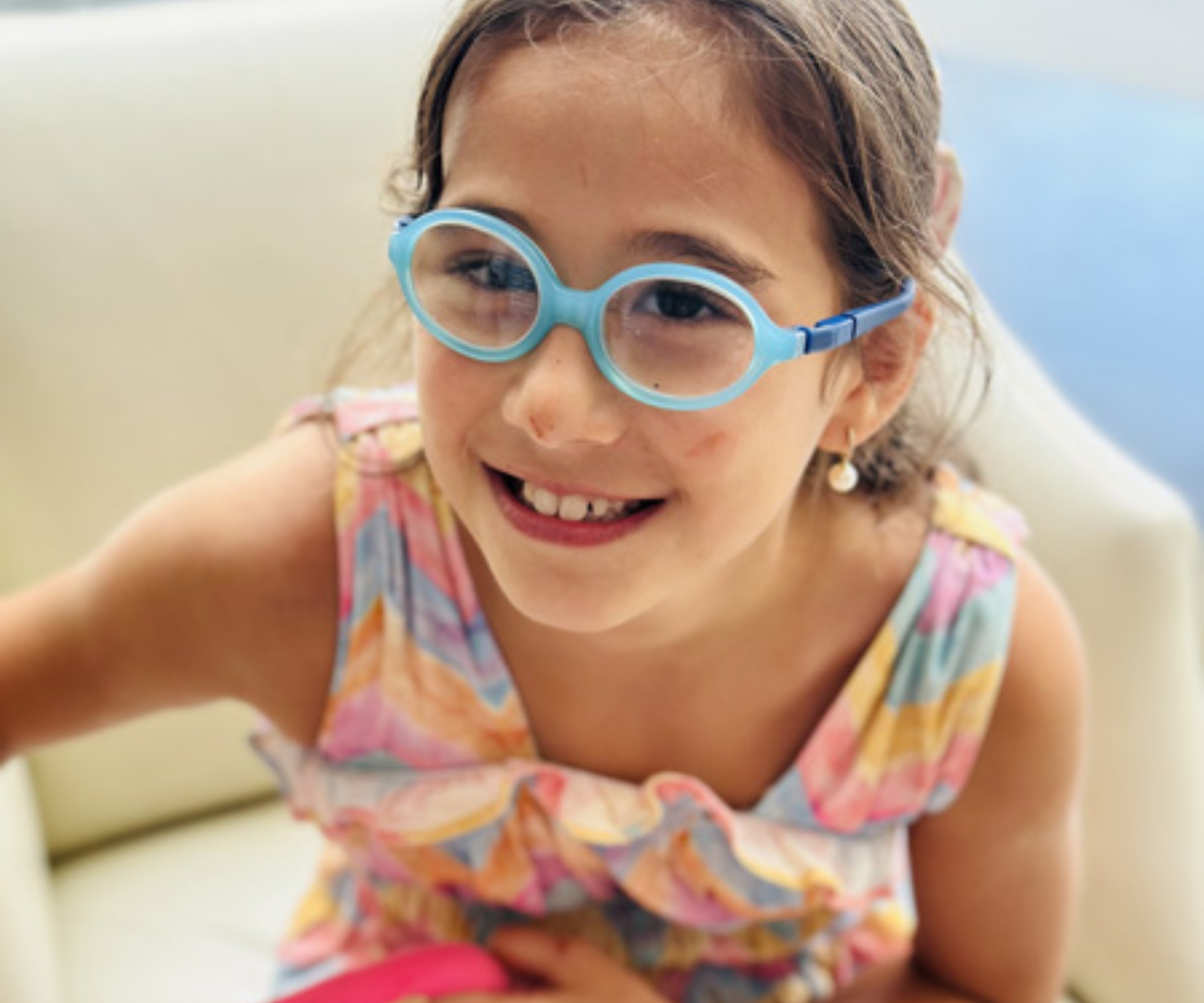 Victoria sitting on a chair