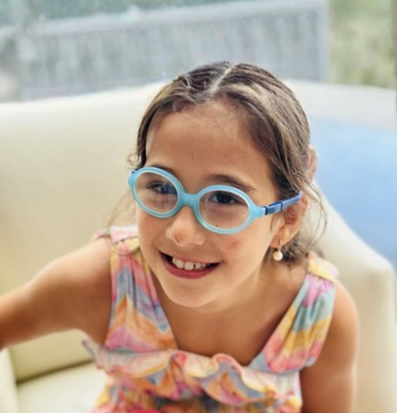 Victoria sitting on a chair