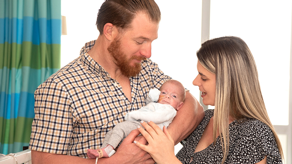 baby Jackson and his parents after his cardiac procedure