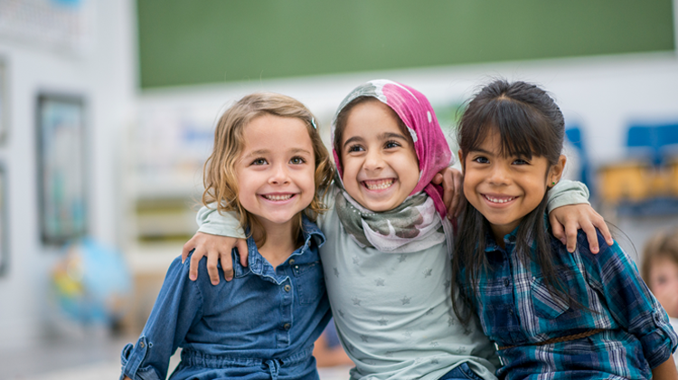 three children smiling