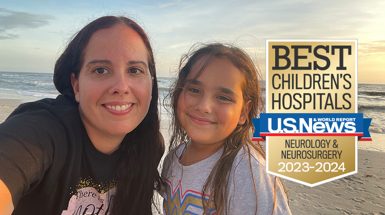 patient nicole and her mother snap a selfie at the beach.