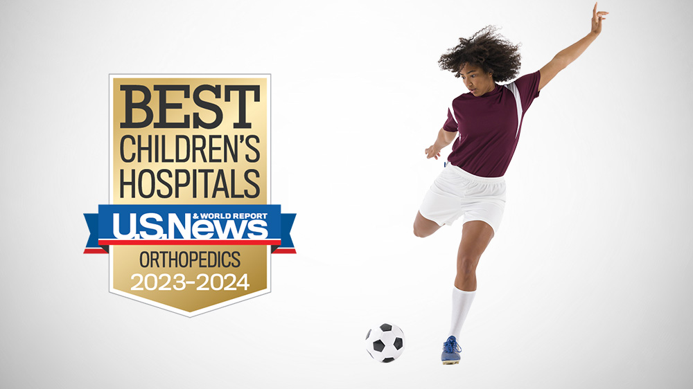 Teenage girl kicking a soccer ball. click to watch a video about our patient rosario.