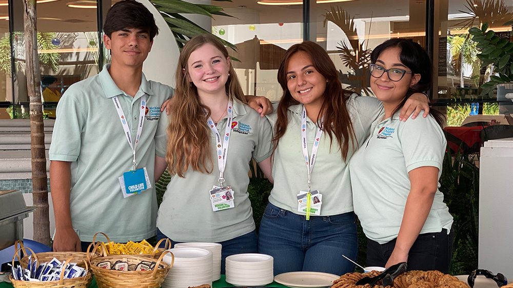 high school volunteers on campus