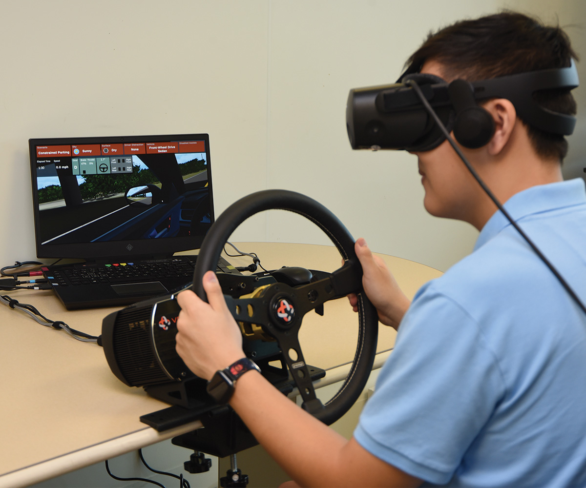 teenage patient using the DRIVE console.