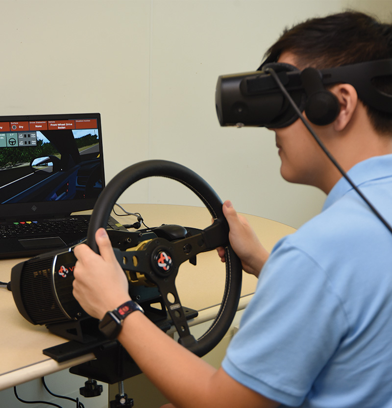 teenage patient using the DRIVE console.