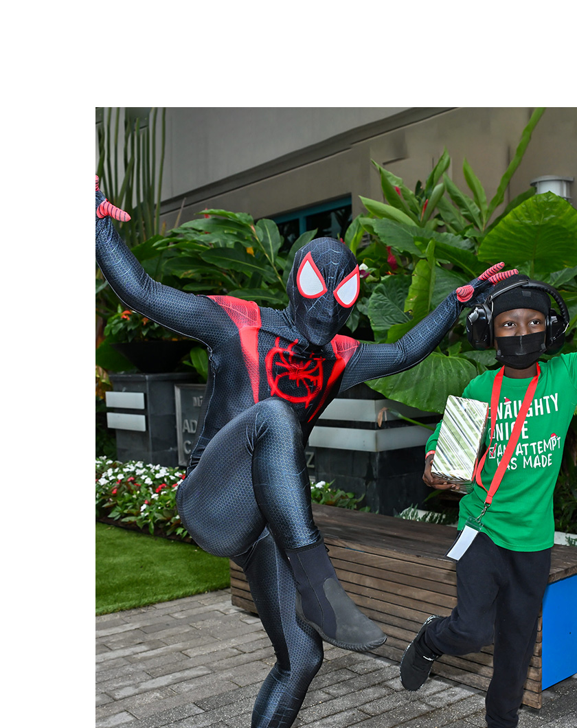 spiderman character posing with patient.