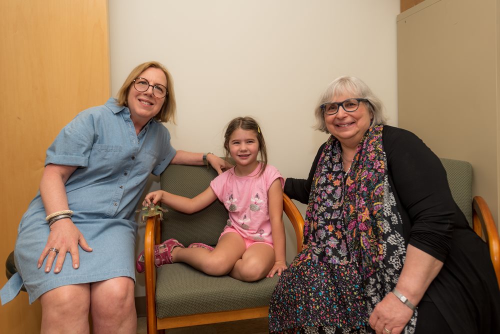 mother, and grandmother and daughter at the clinic.