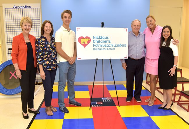 Colton smith, with his mother Jean, Michelle McGann, Jack & Barbara Nicklaus and Dr. Palau