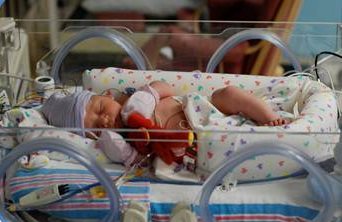 Baby Asher in a hospital incubator.