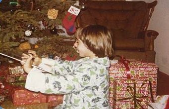 Dana opening Christmas presents