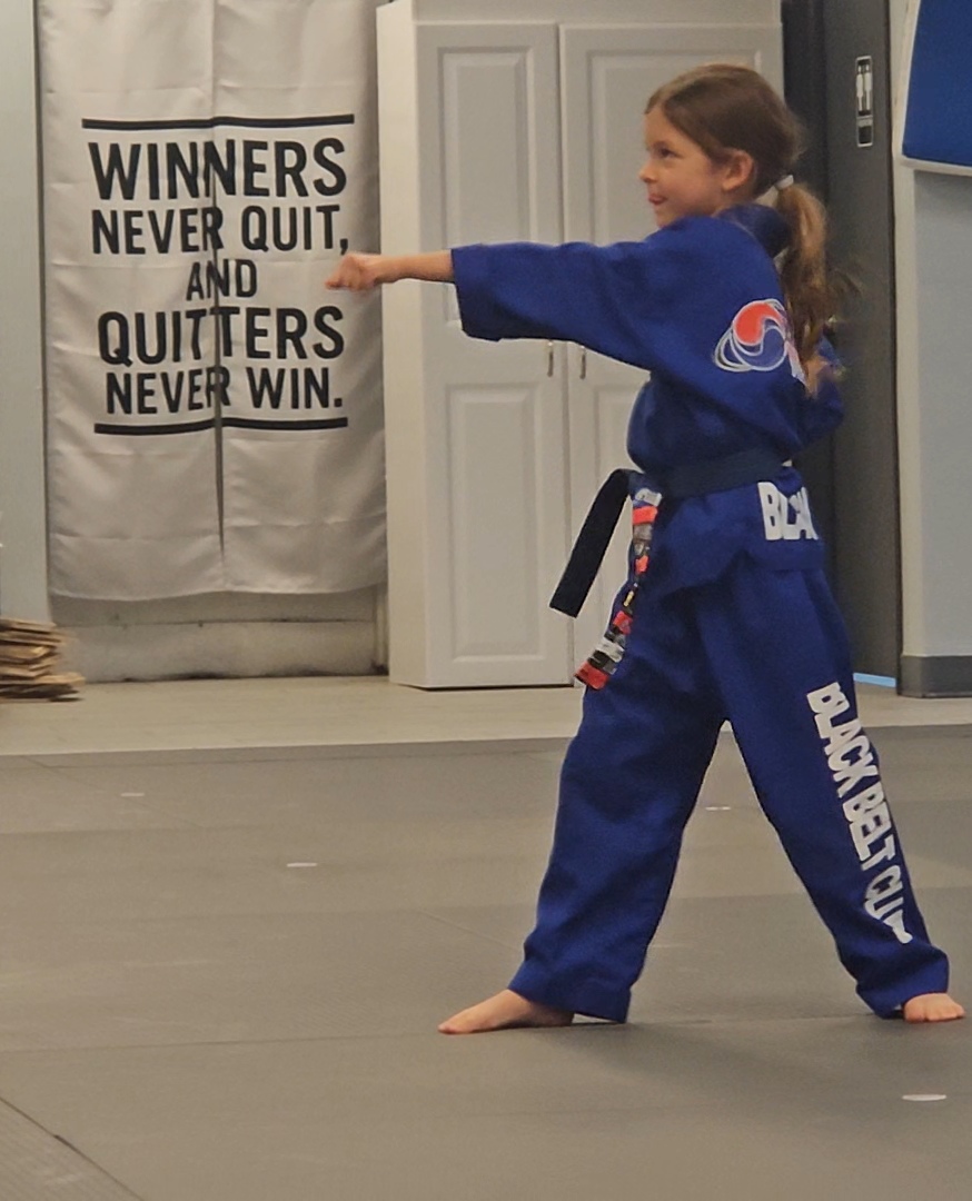 Emma doing taekwondo