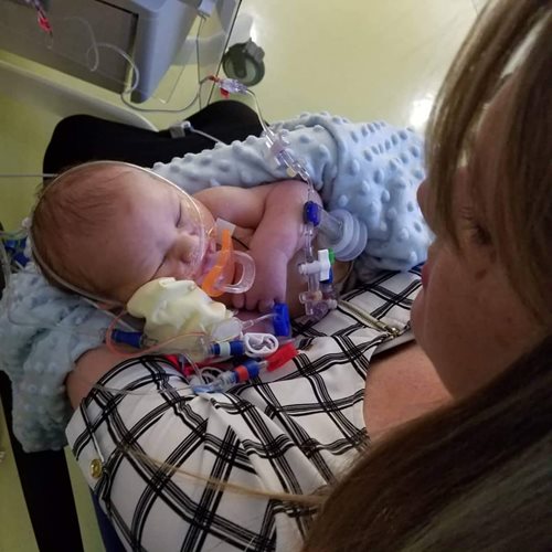 Gabrien with his mom during procedure