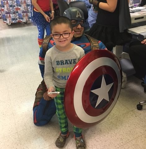 Jose with captain America at the hospital. 