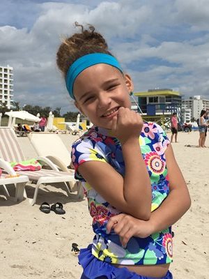 Stephanie at the beach smiling