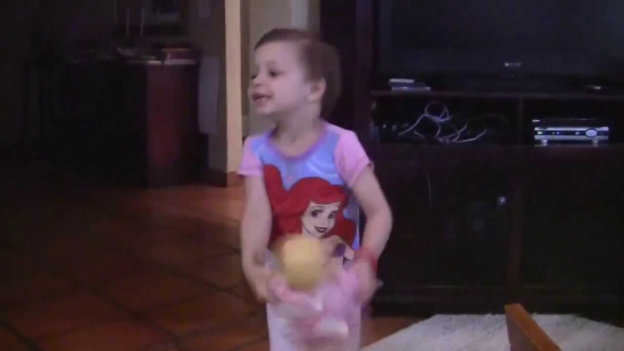 Ava playing with a doll 
