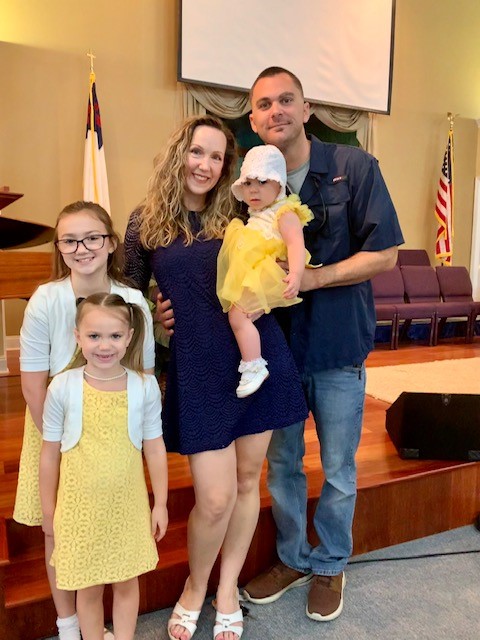Crystal with her husband and 3 daughters.