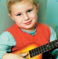 Ryan playing with a toy guitar