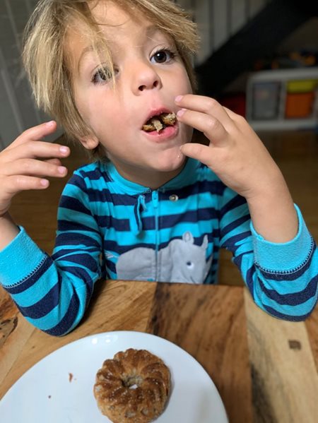 tomas eating a snack