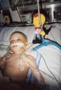 Joshua in the hospital on oxygen.