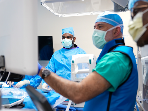 Dr. Sathanandam performing bedside PDA closure