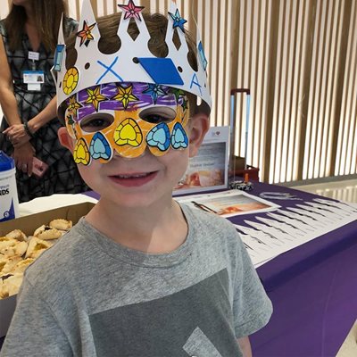 boy wearing purim crown