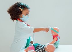 little girl playing doctor