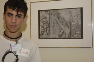 Noah Farid, 14, with his artwork